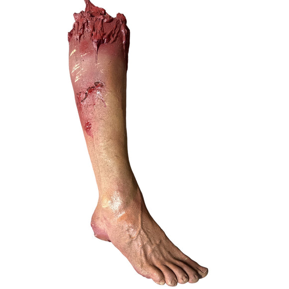 Handcrafted severed leg prop made out of urethane foam rubber 